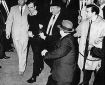 463px-Lee_Harvey_Oswald_being_shot_by_Jack_Ruby_as_Oswald_is_being_moved_by_police,_1963